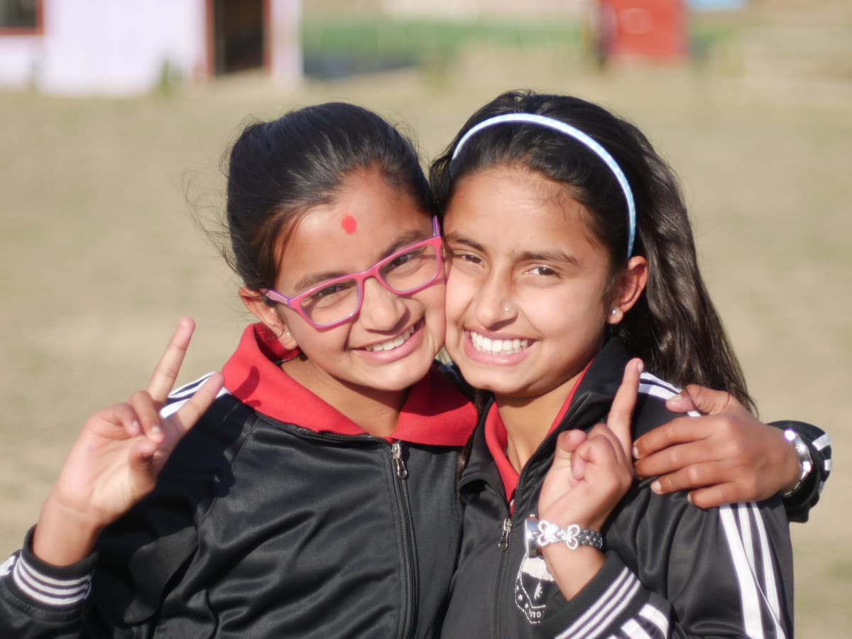 Two girl students posing for a photo